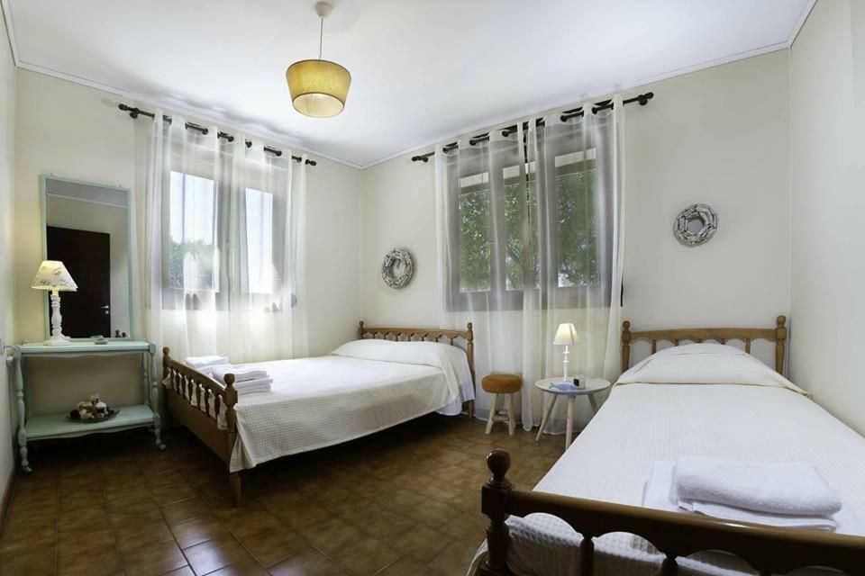 To Ktimataki Villa Agios Gordios  Eksteriør billede